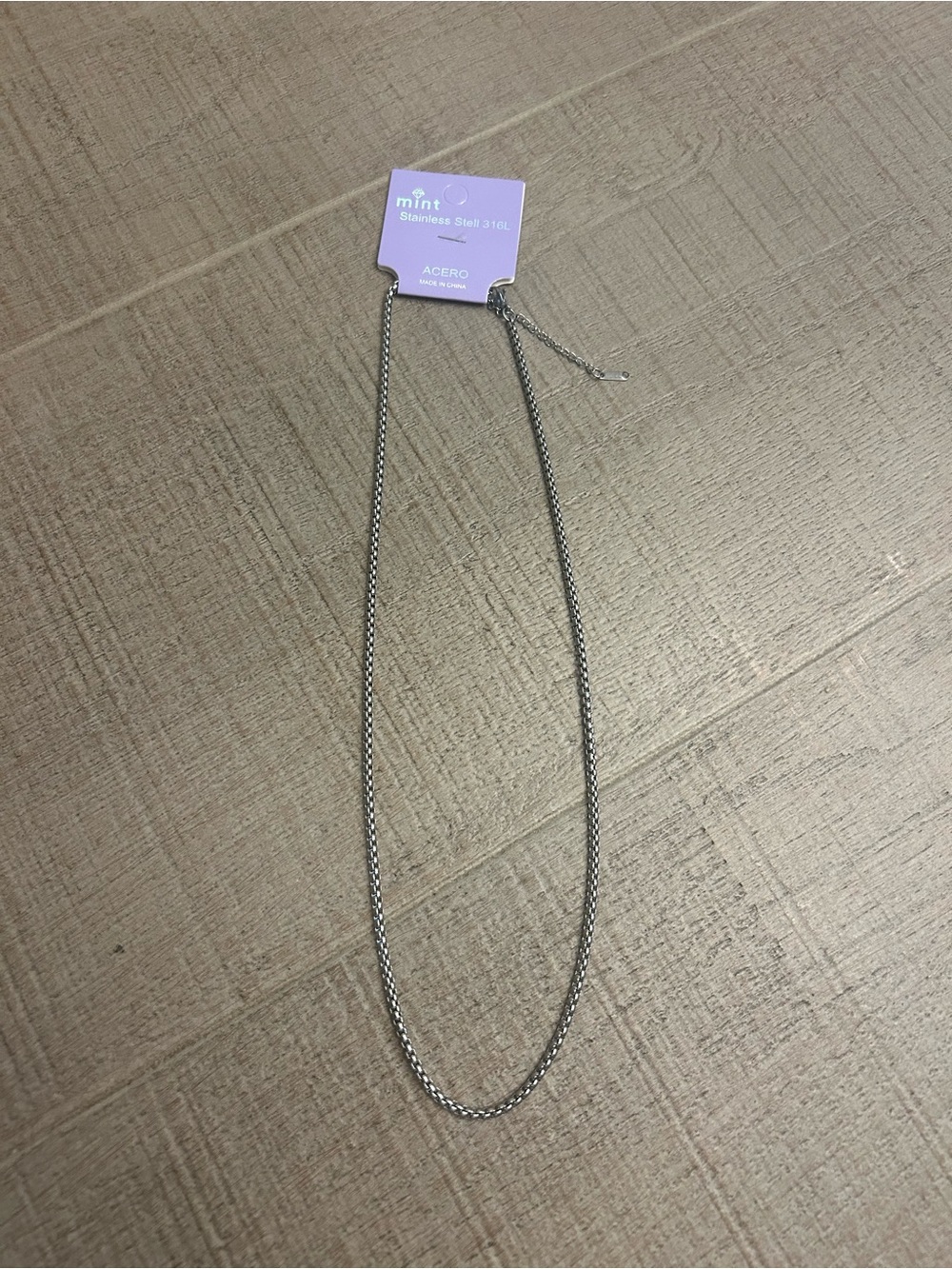 Accessories — Likely Necklace/Chain